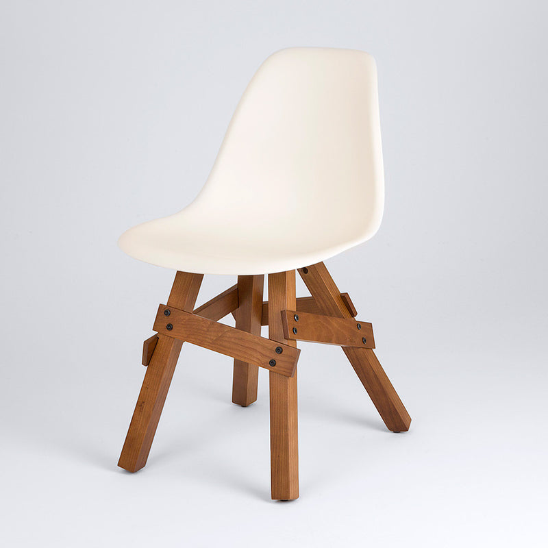 Modern Icon side chair in ivory shell with walnut wood legs front view