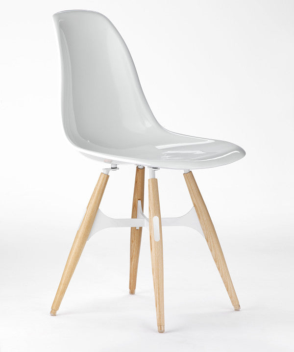 ZigZag modern dining chair with solid white shell and ashwood base
