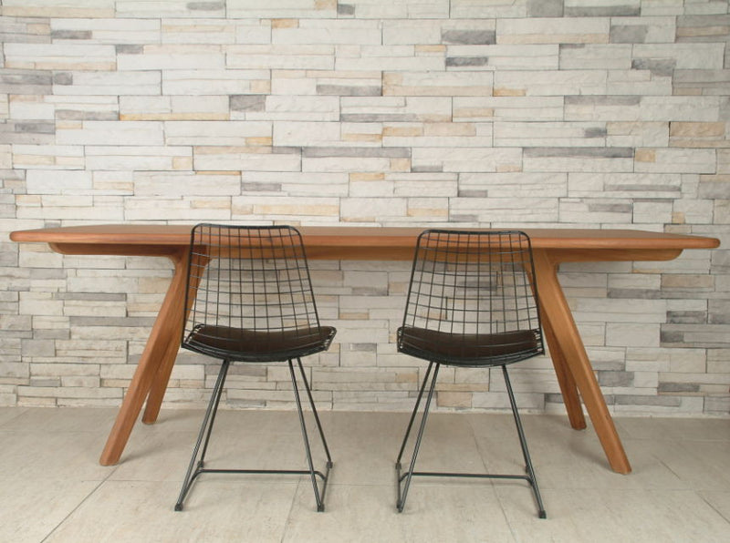 Charles modern dining table in room setting 