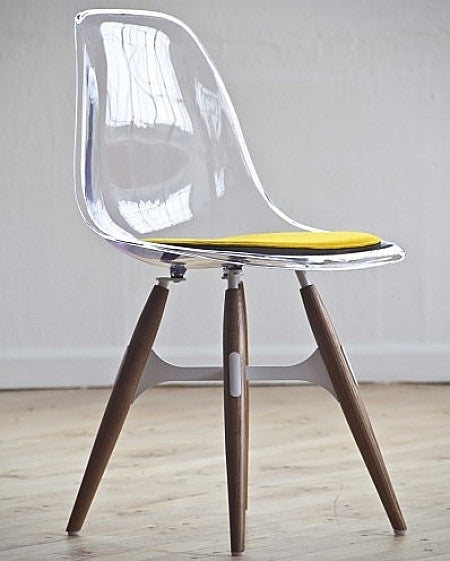 ZigZag modern dining chair with transparent shell and yellow seat pad